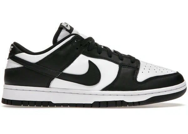 Side view of black and white Nike Dunk shoes.